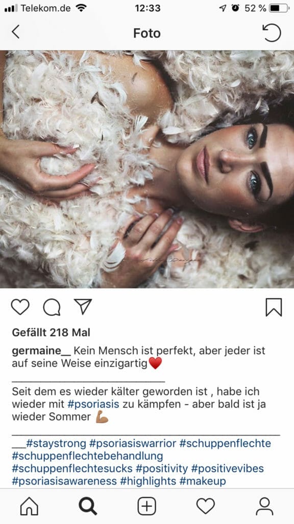 Instgram-Post von Germaine der Sie mit Federn bedeckt zeigt