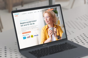 HelgaHilft Startseite auf einem Laptop